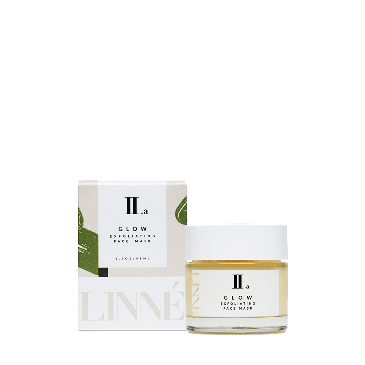Facial mask in jar next to green and white box