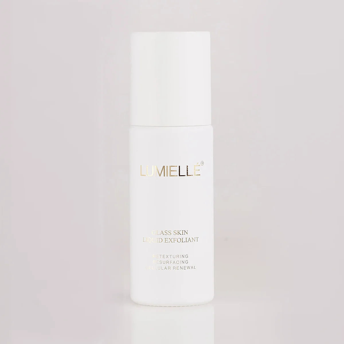 Skincare product bottle with 'Lumielle' branding on a light gray background